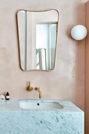 Indoor mirror with organic lines, designed in Italy
