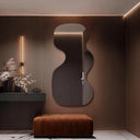 Grand miroir mural LED rétro-éclairé asymétrique ondulé ÉVÉLINA