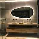 Miroir de forme organique “POISSON” – éclairage LED pour ambiance douce