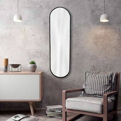 Miroir mural ovale avec encadrement en métal – style décoratif moderne