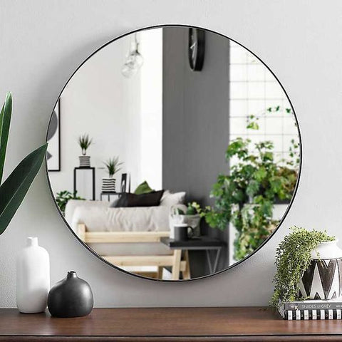Miroir mural rond avec cadre noir – style épuré et moderne