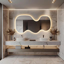 Grand miroir mural LED rétro-éclairé asymétrique ondulé ÉVÉLINA